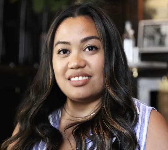 a woman smiling for the camera